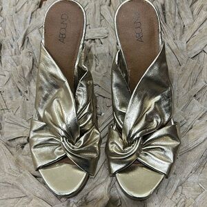 Stunning gold metallic mules